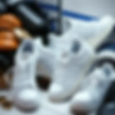 Collection of Sneakers with Fashion Accessories A collection of Adidas white sneakers displayed with fashion accessories