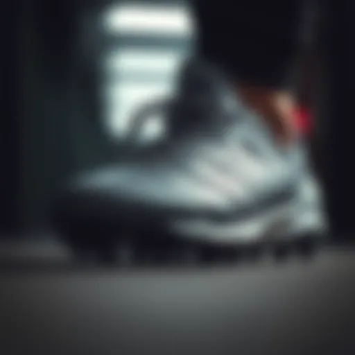 Close-up view of the adidas Ghosted cleats showcasing advanced design features.