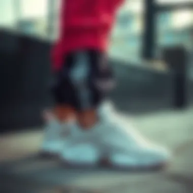 Adidas Ozweego shoes paired with sporty casual outfit.