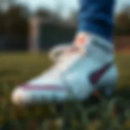 Close-up of a high-performance soccer cleat on a grassy field