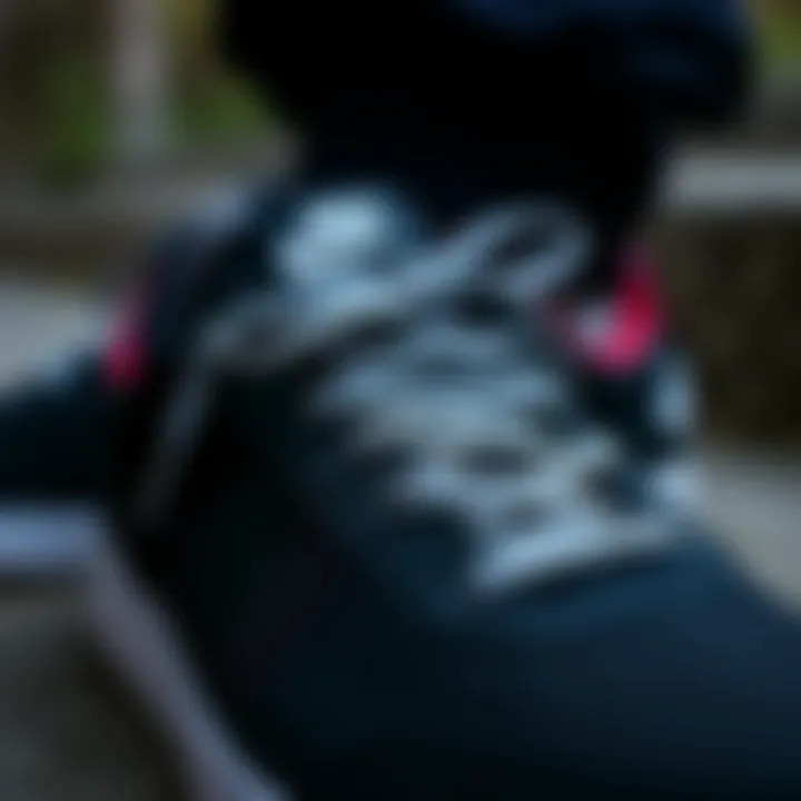 Close-up of the design details of black sports sneakers