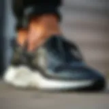 Elegant black sports shoes paired with casual attire